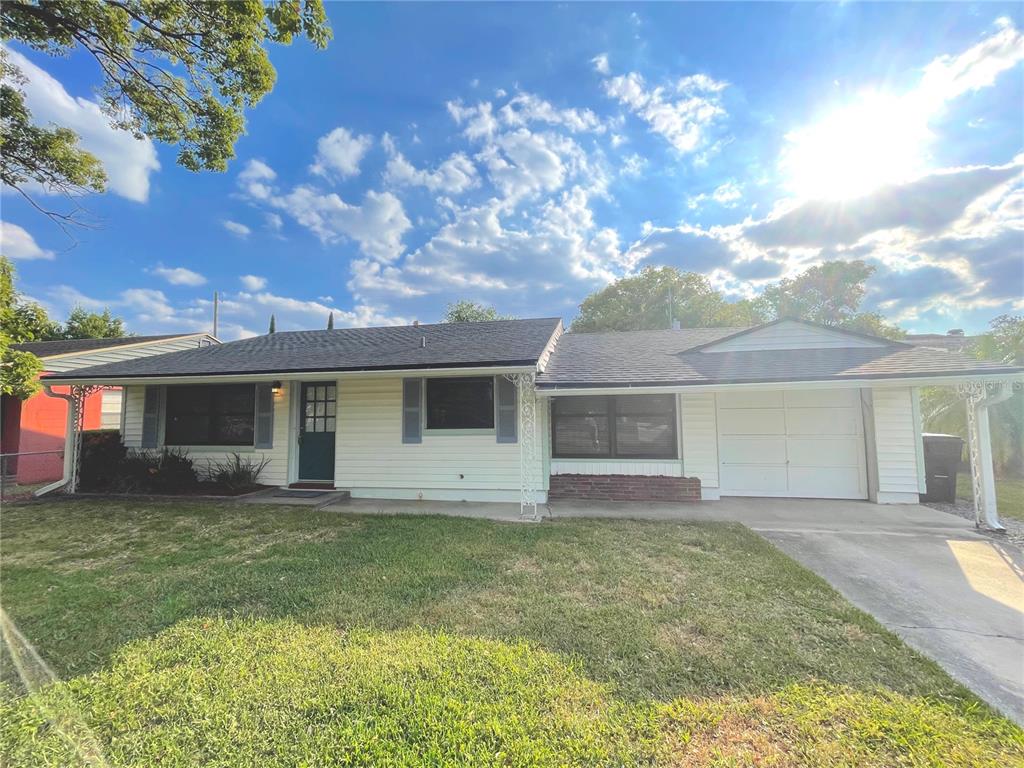 front view of a house with a yard