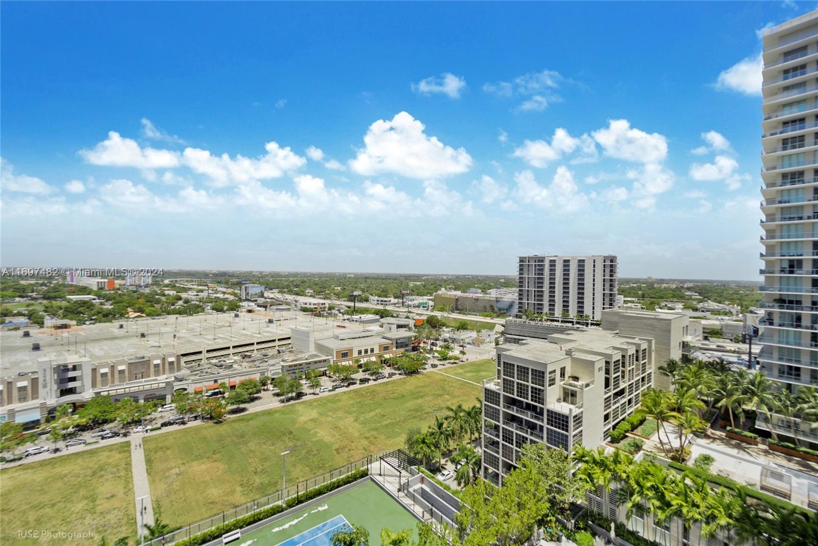 a view of a city with tall buildings