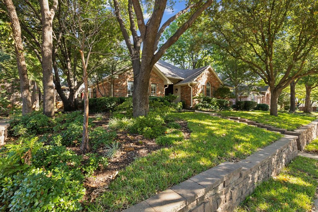 a backyard of a house with lots of green space