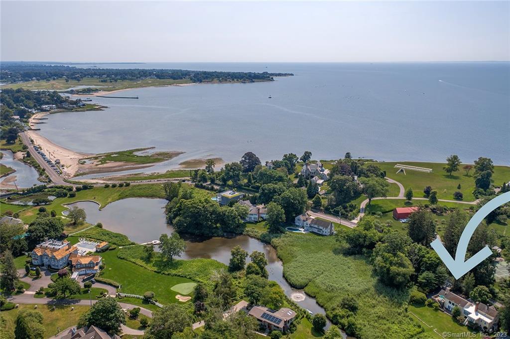 an aerial view of a houses and an outdoor space