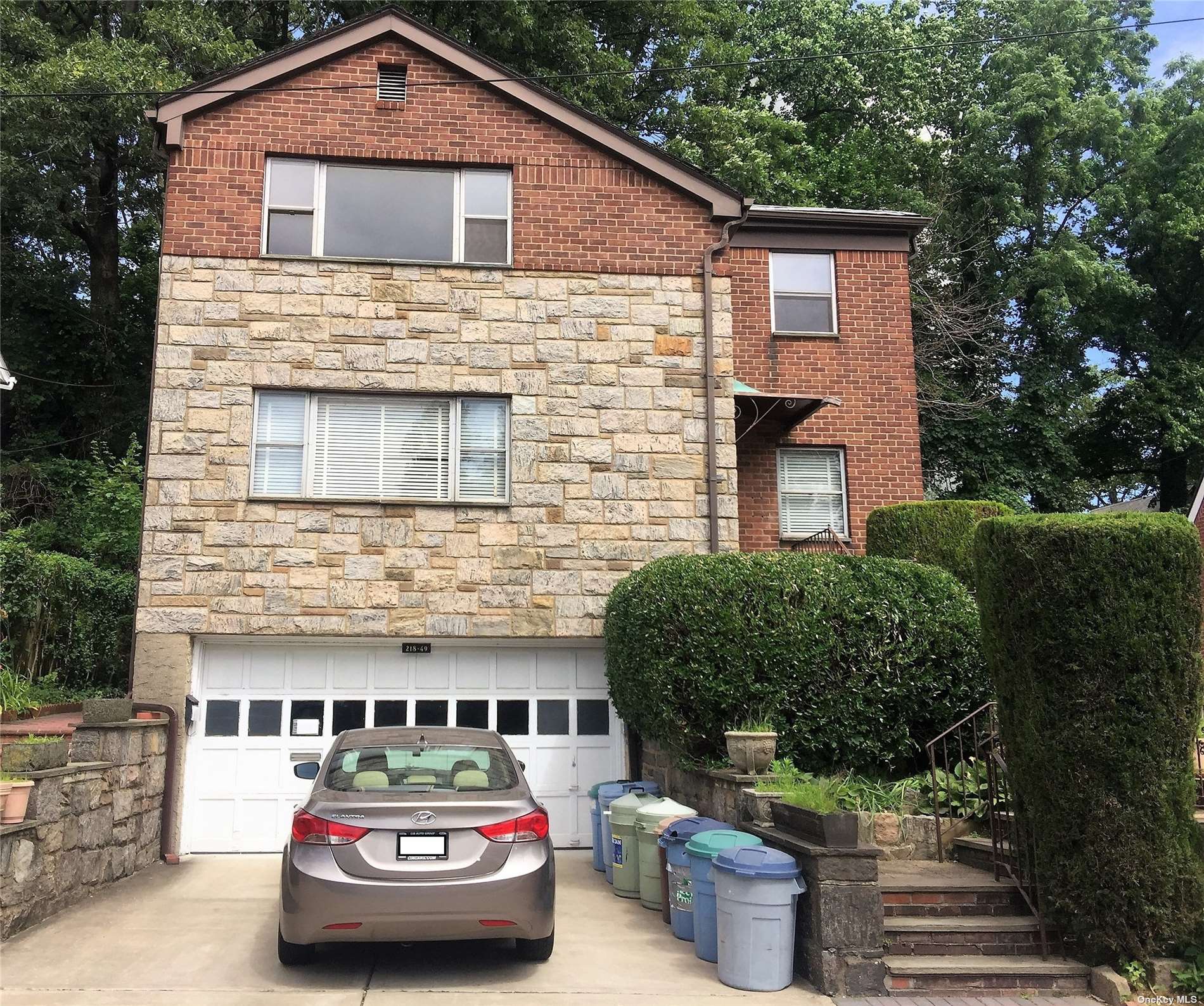 a car parked in front of a house