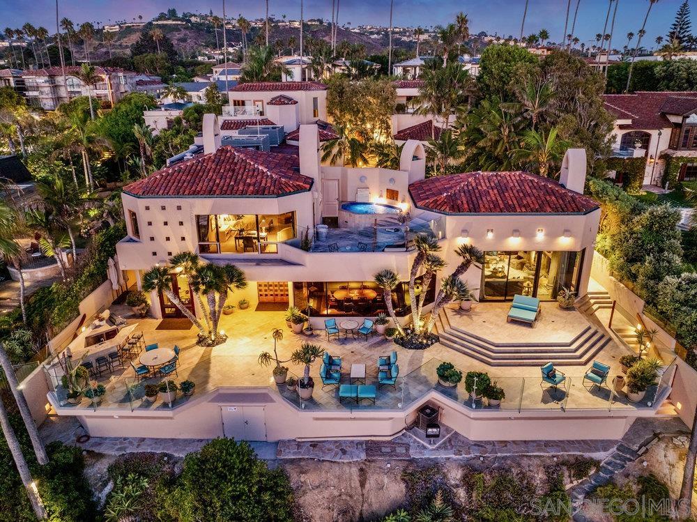 an aerial view of residential houses and outdoor space