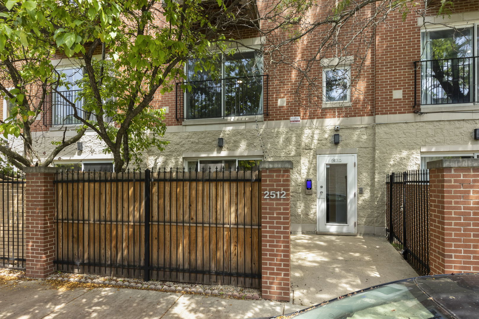 a view of a entrance gate of a house