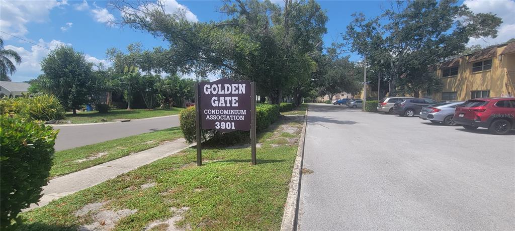 a sign board with parking space