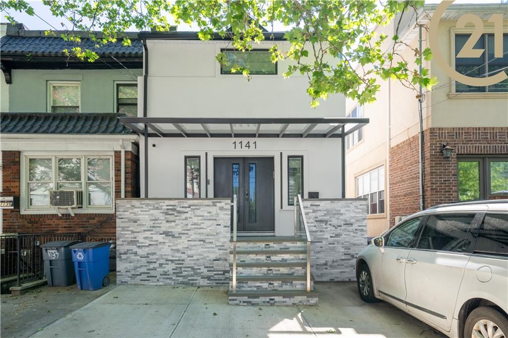 a view of a house with a parking space