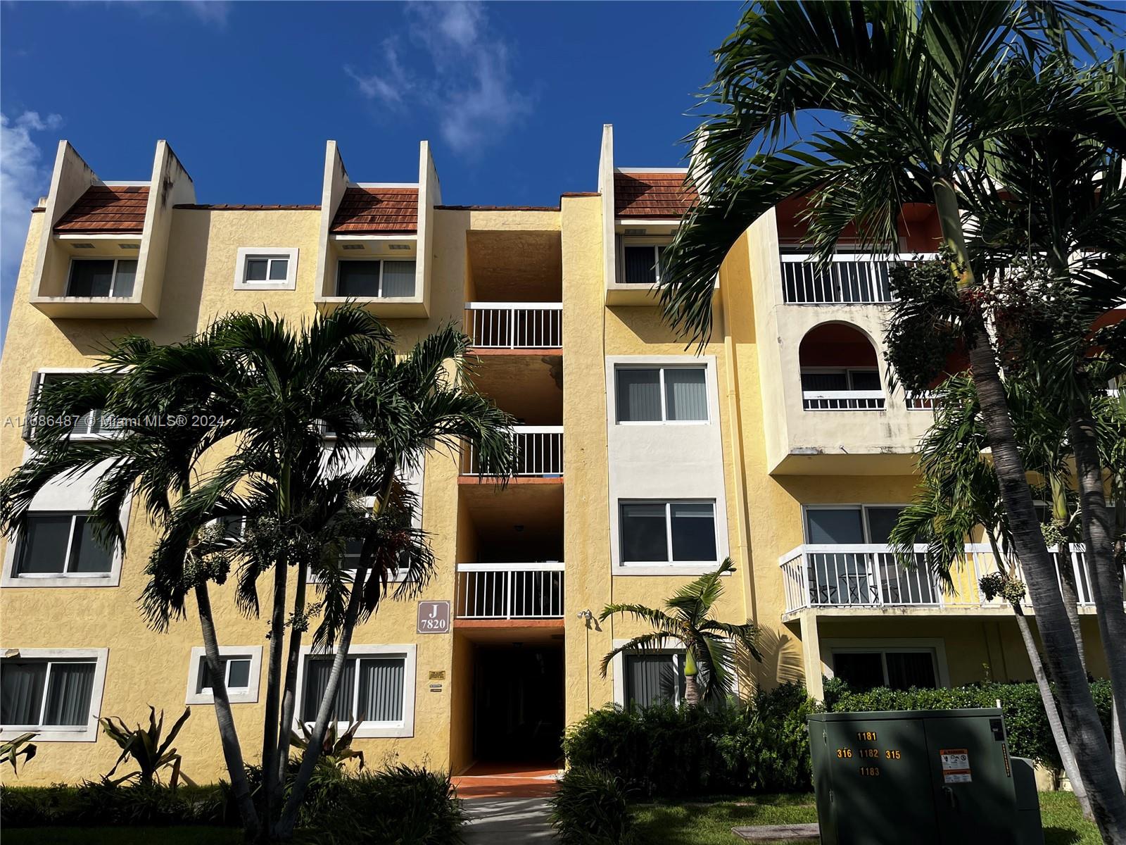 a front view of a multi story residential apartment building