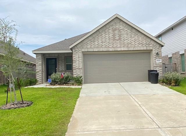 a front view of house with yard