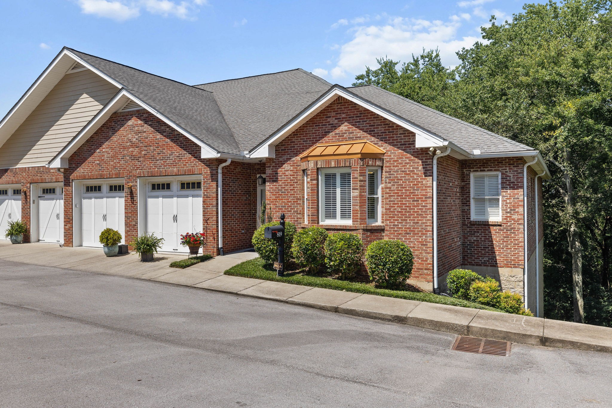 front view of a house with a small yard