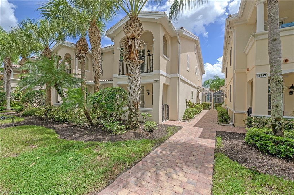 a view of a pathway with a house