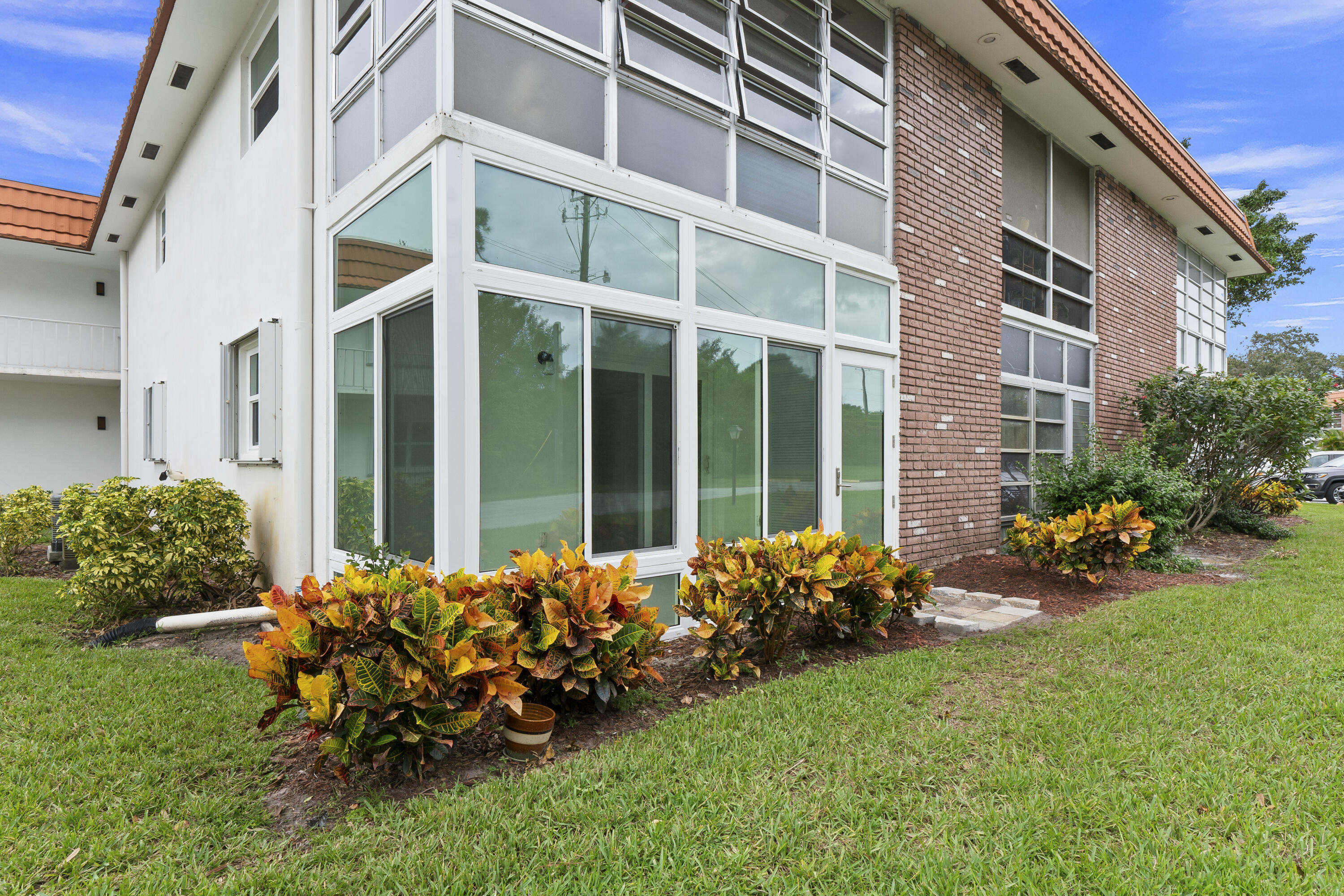 a garden view with a sitting space