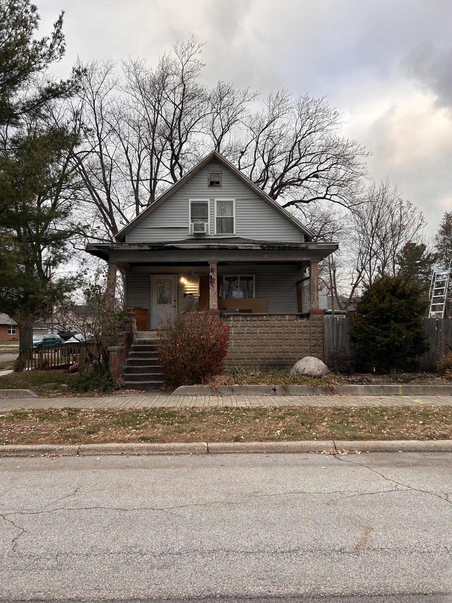 a house with trees in the background