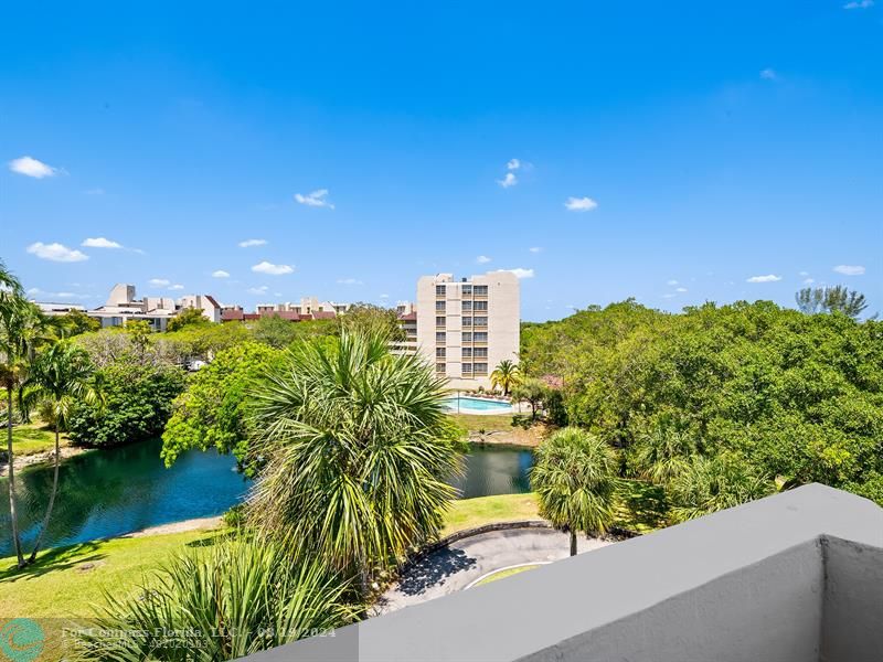 a view of a balcony with lake view