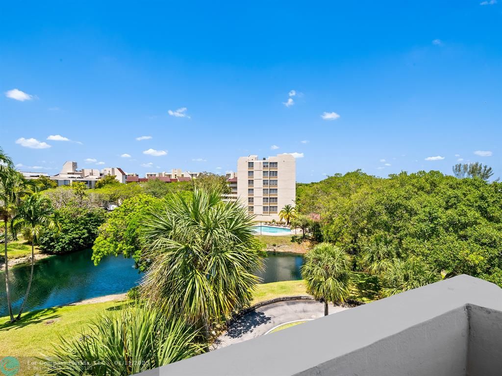 a view of a balcony with lake view