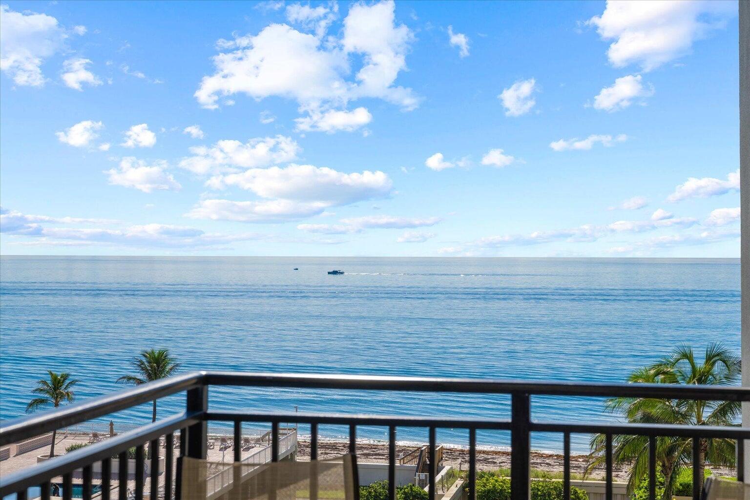 a view of an ocean from a balcony