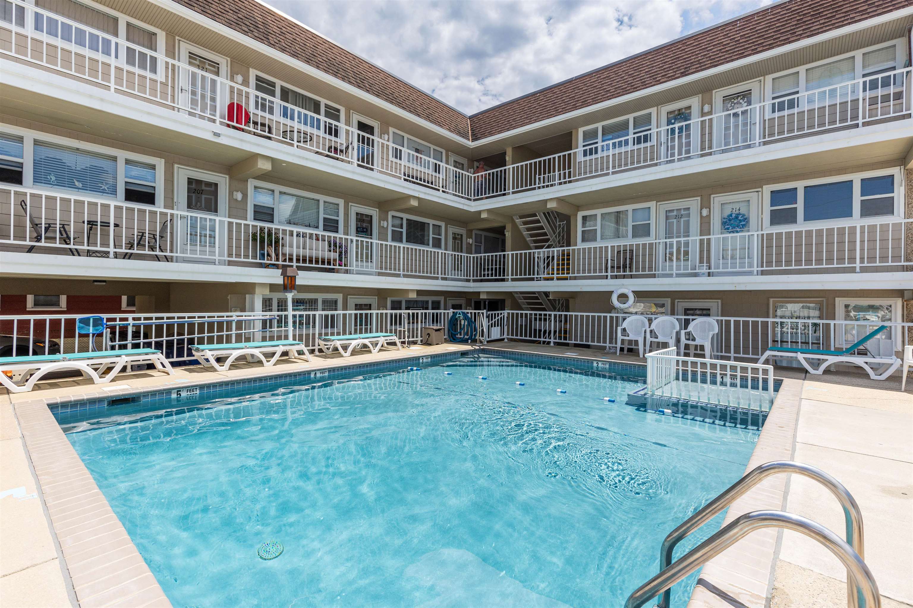 a view of a building with a swimming pool