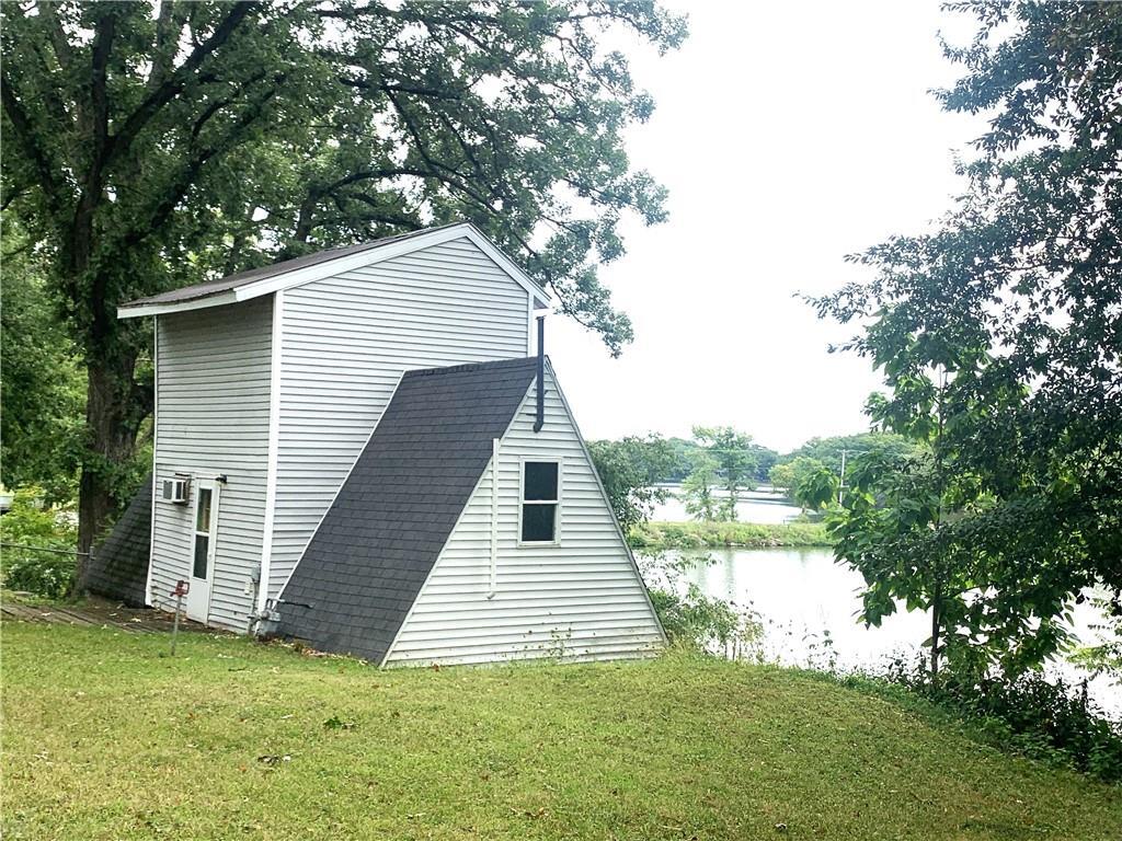 a view of a house with backyard