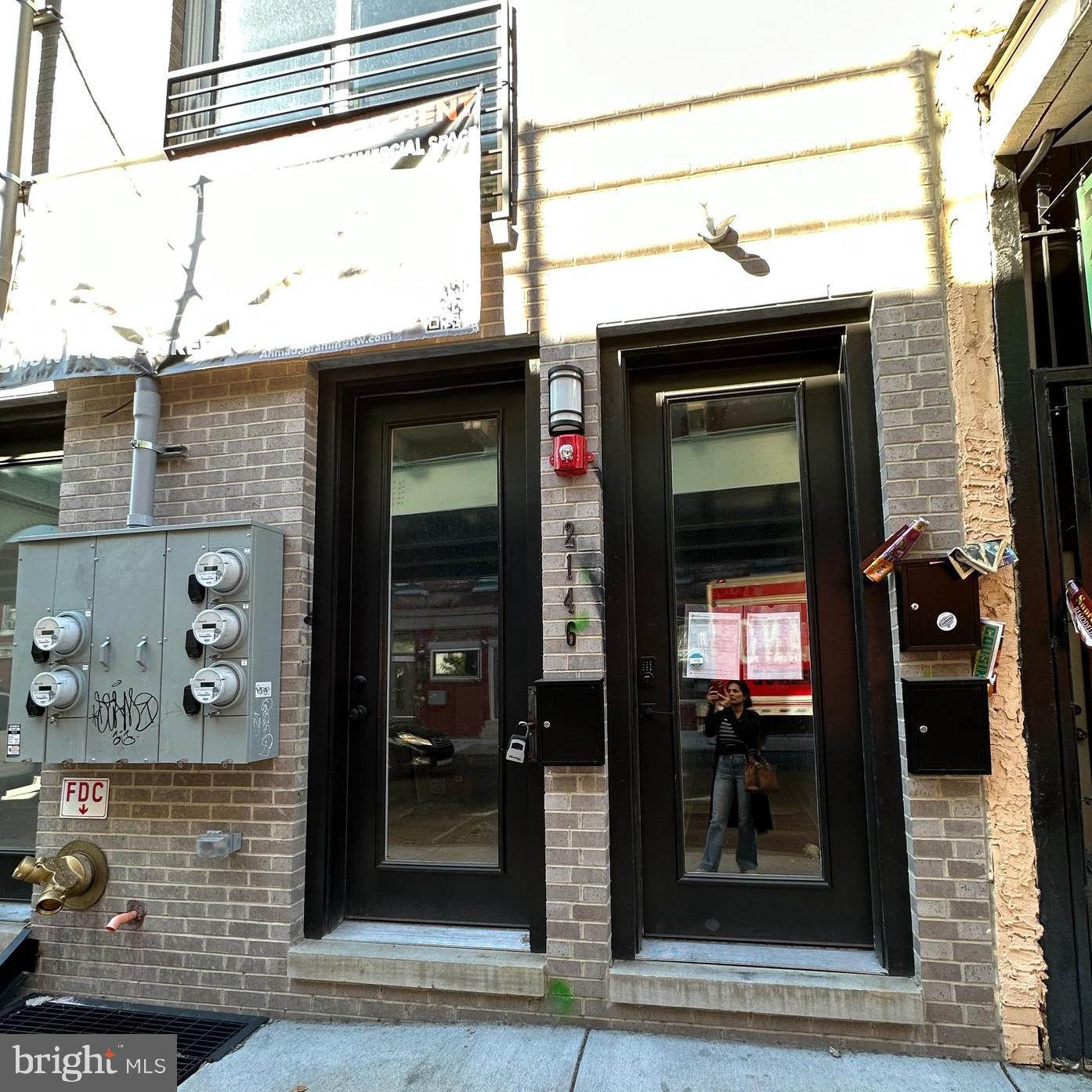 a front view of a building with a glass door