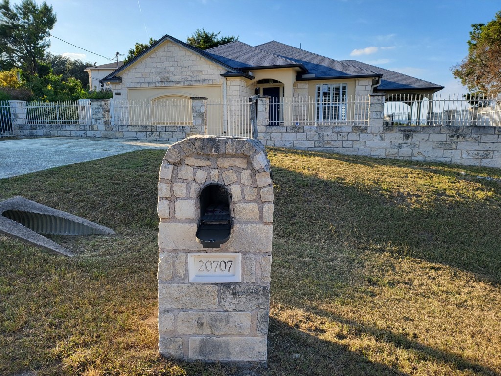 a front view of a house with yard