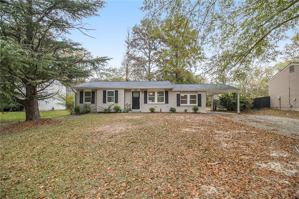 front view of a house with a yard