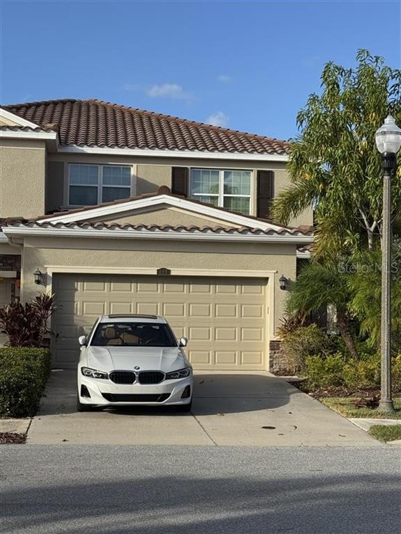 a car parked in front of a house