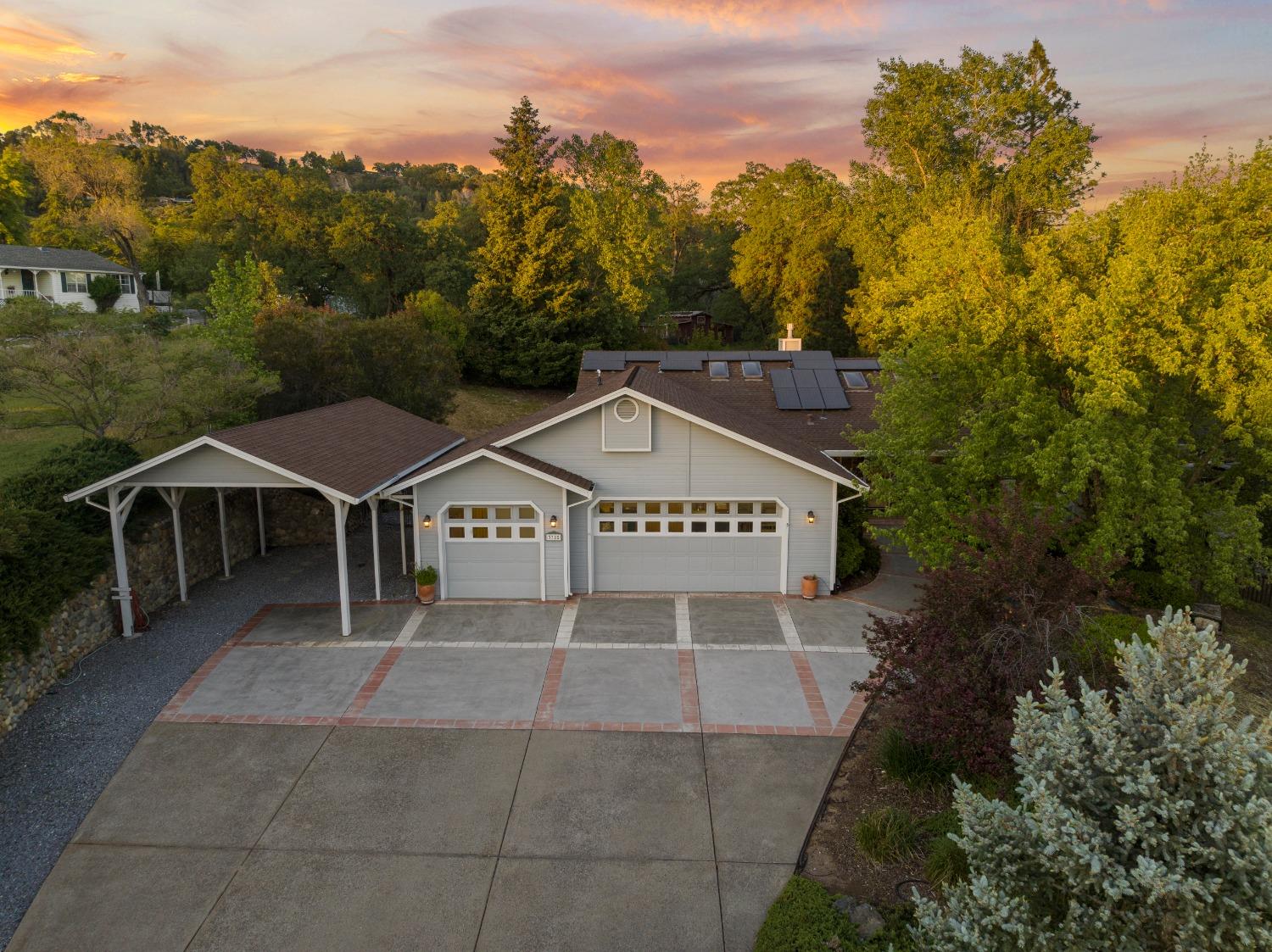 a house with trees in the background