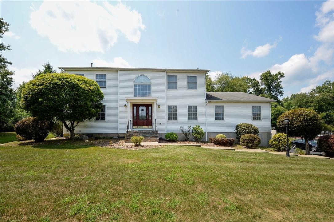 View of front of home with a front lawn