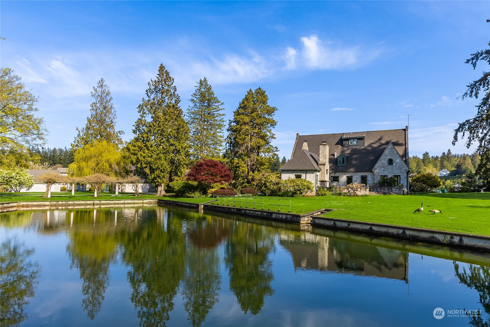 a view of a lake with a building in the background