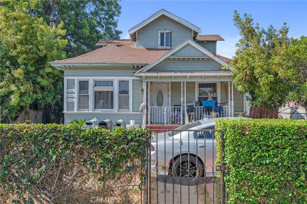 a front view of a house with a porch