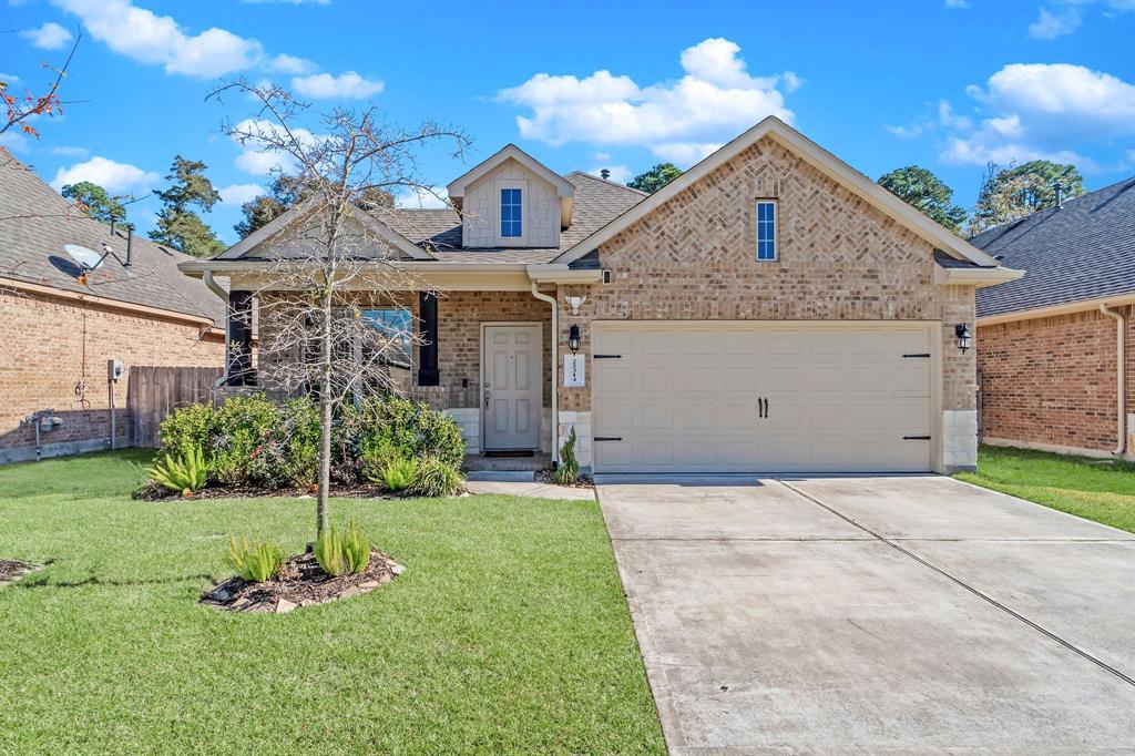 Fantastic ranch for rent on a private lot with no back neighbors! Cute front porch and large 2 car garage. Brick and stone front!