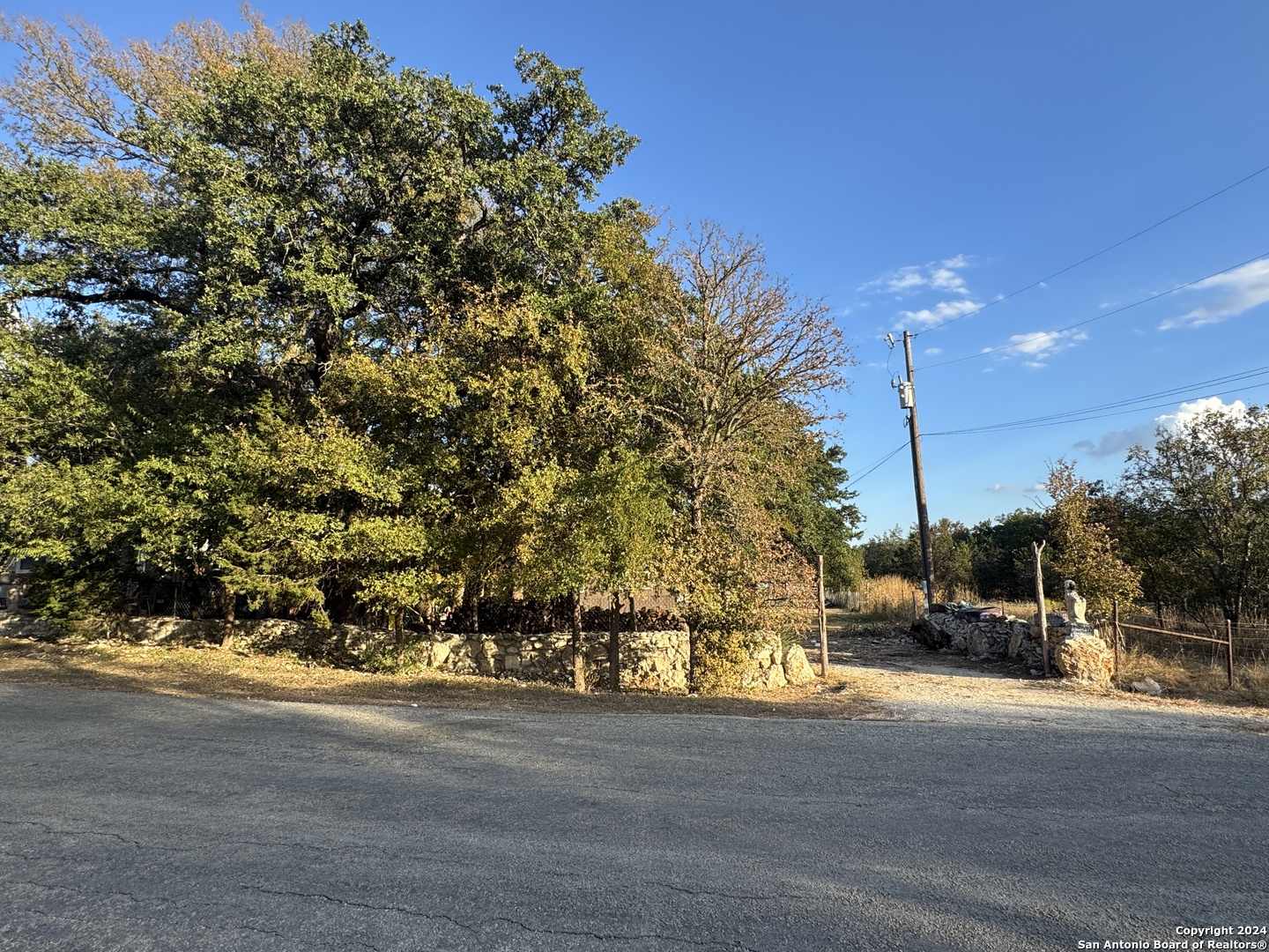 a view of road with trees