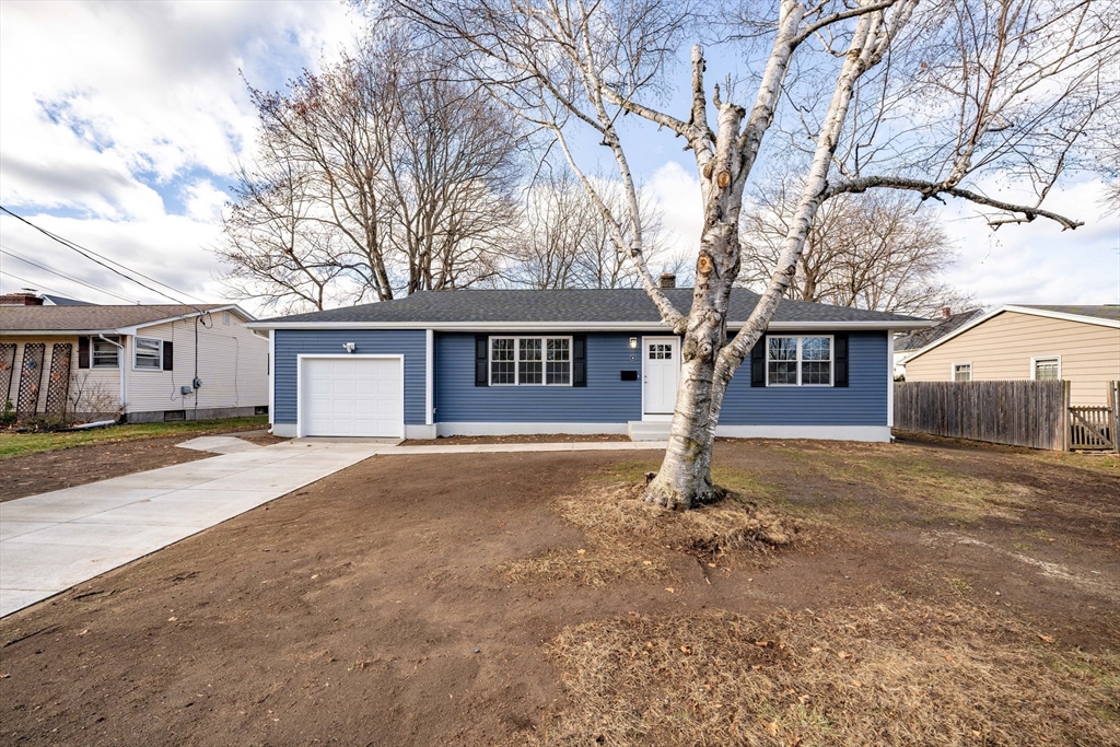 a house with trees in front of it