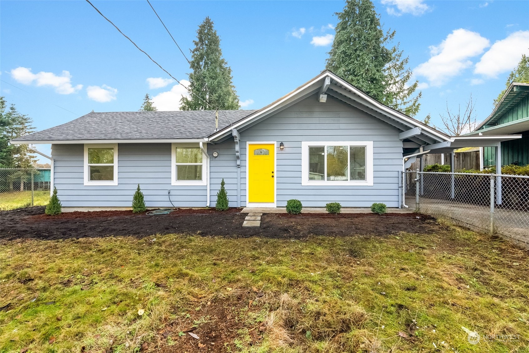 a house view with a garden space