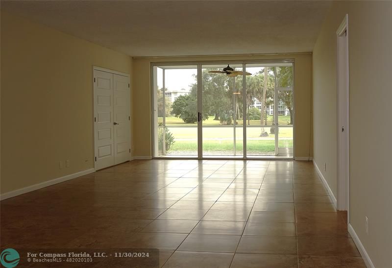 a view of an empty room and window