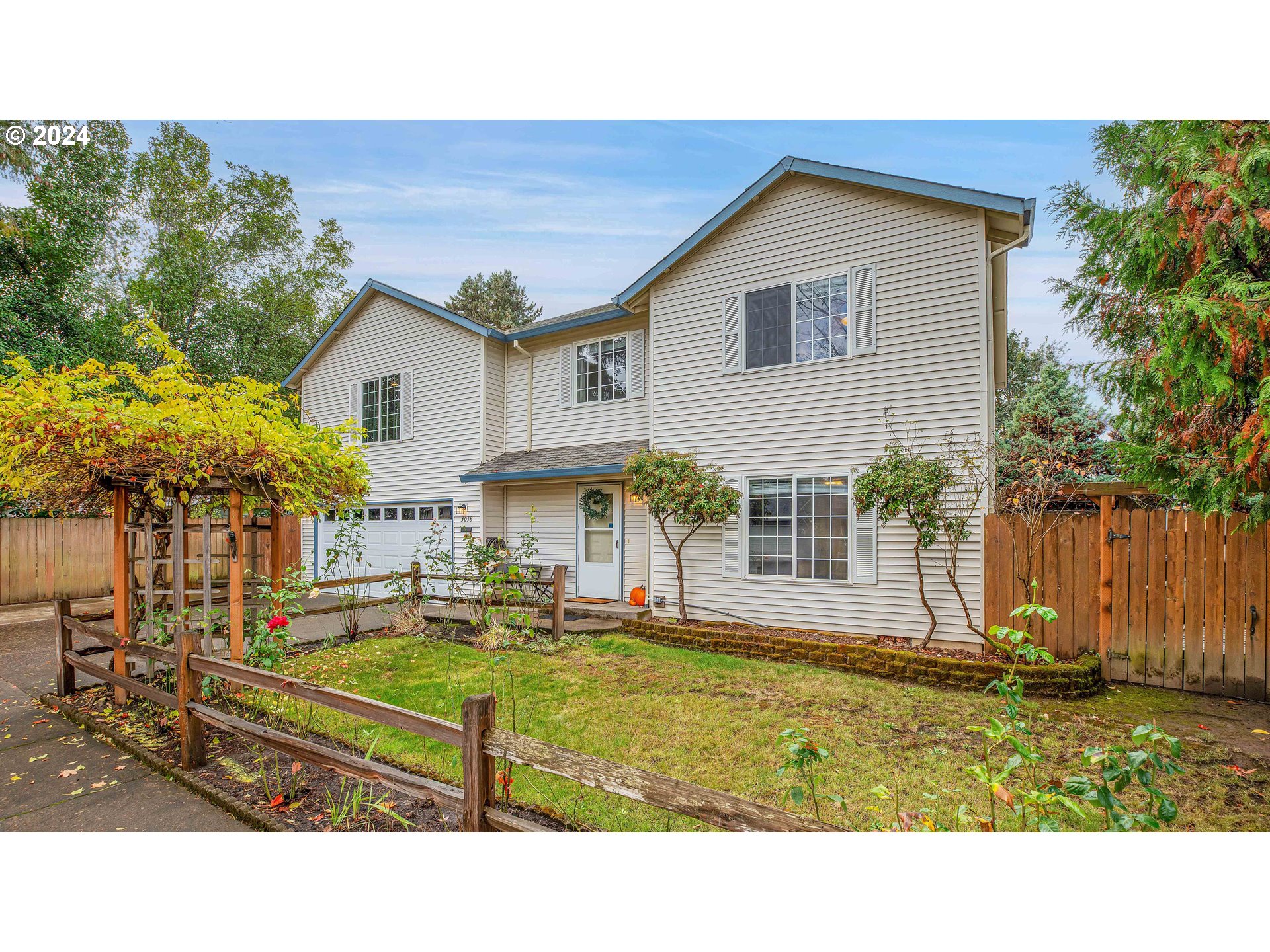 a house view with a garden space