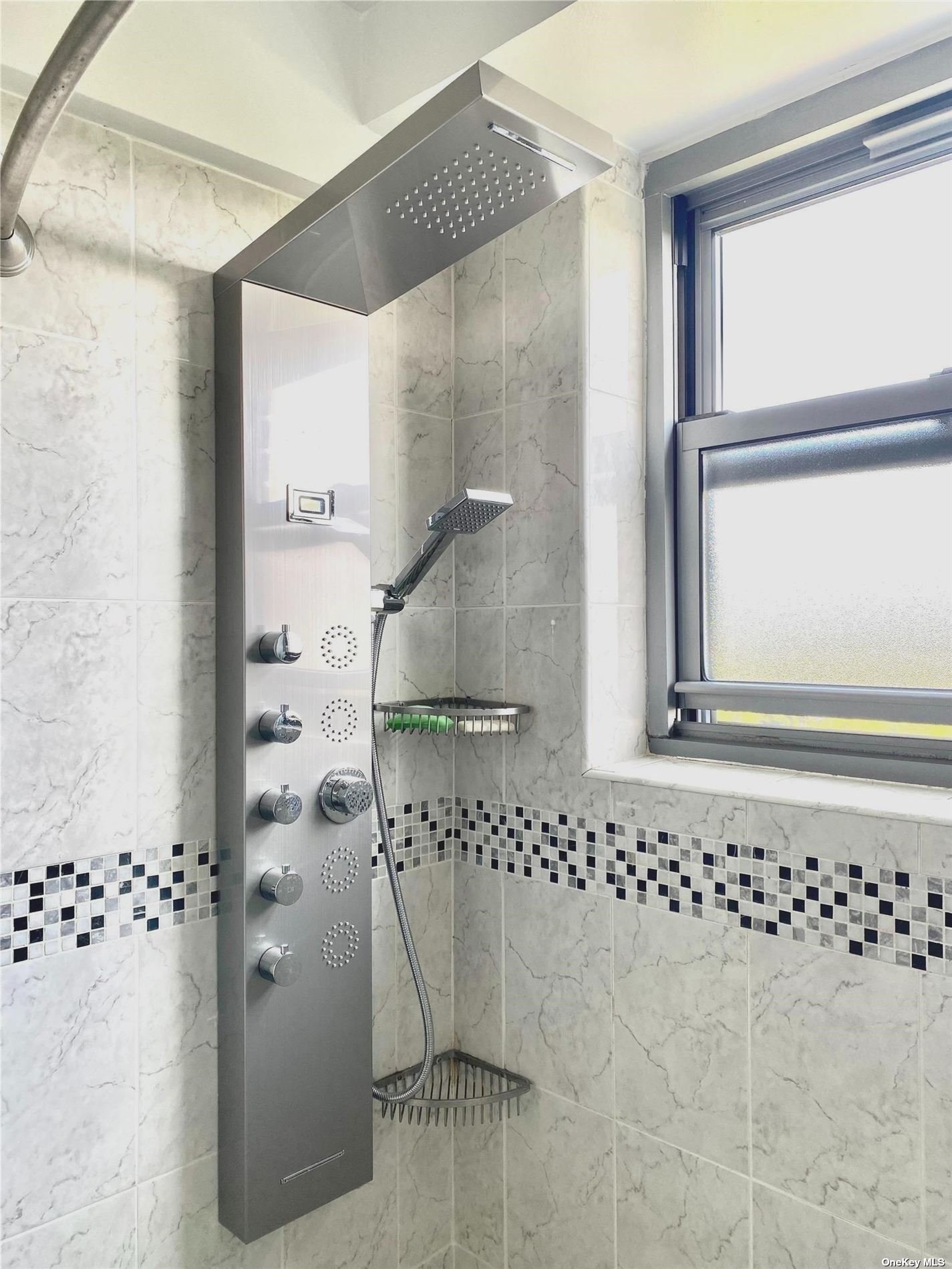 view of a bathroom with a shower