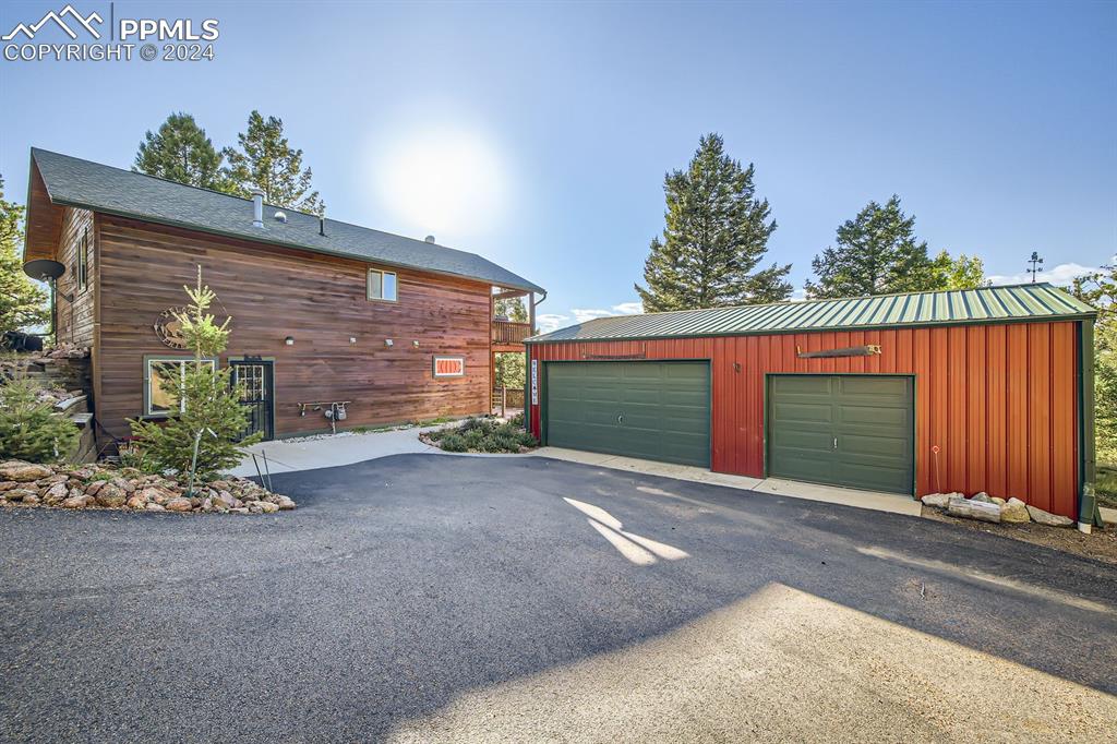 Garage featuring wood walls