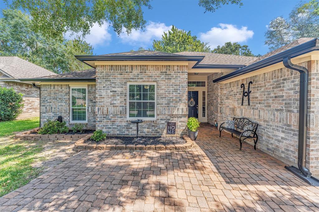 a front view of a house with patio