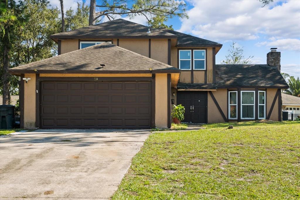 a house with yard in front of it