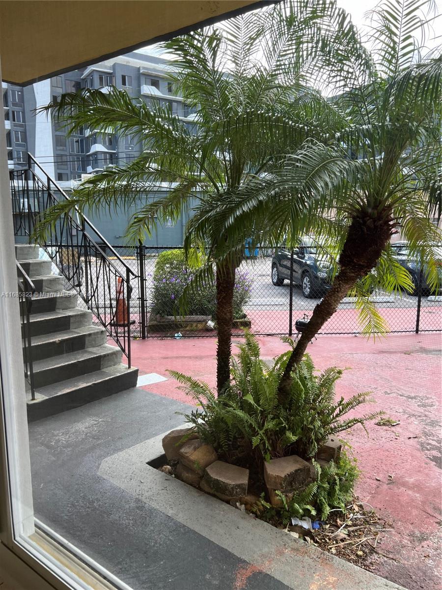 a view of street with sitting area