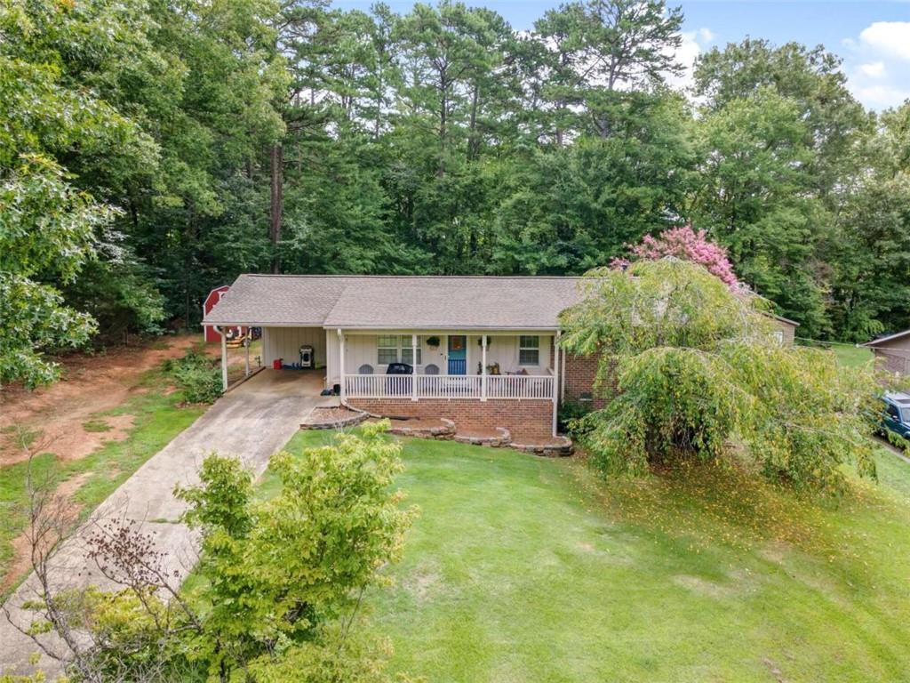 front view of a house with a yard