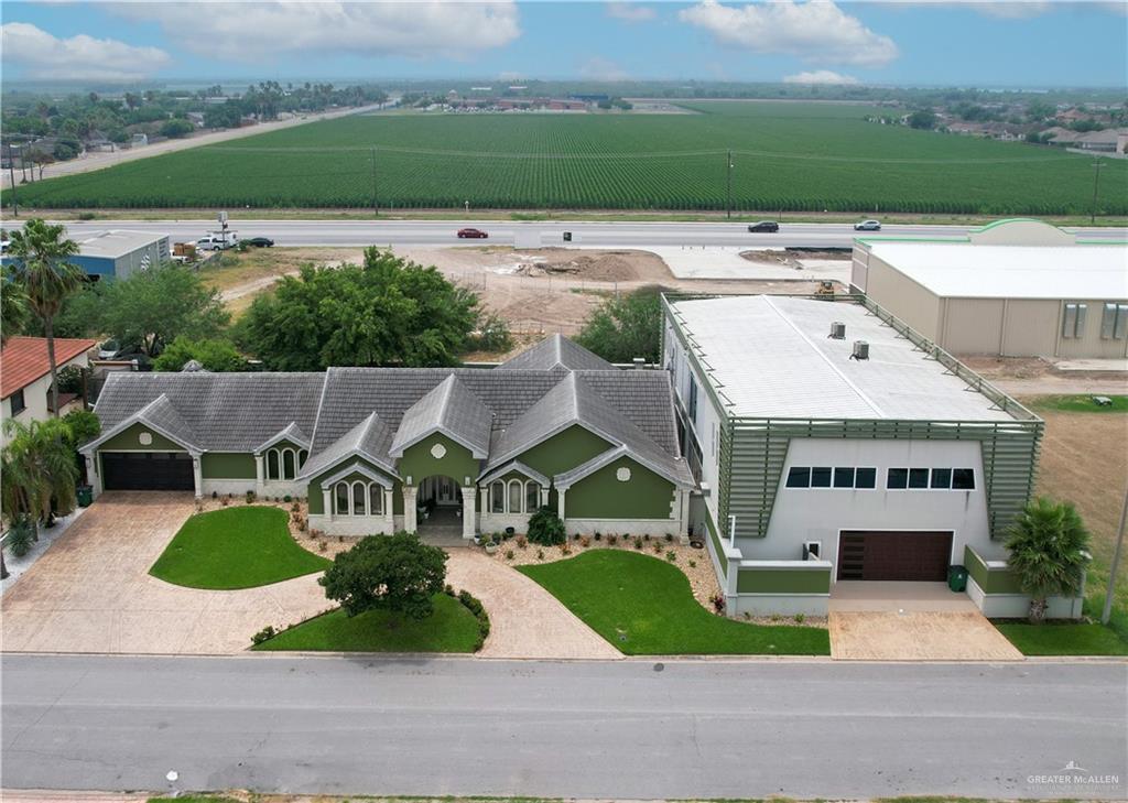 an aerial view of a house with a garden