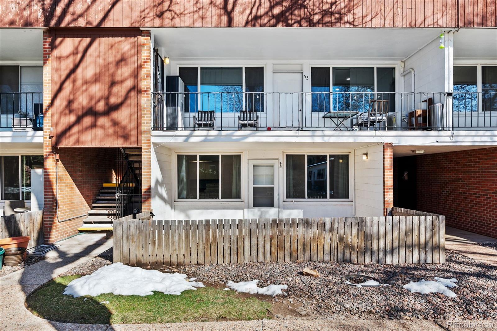 a front view of a house with a porch