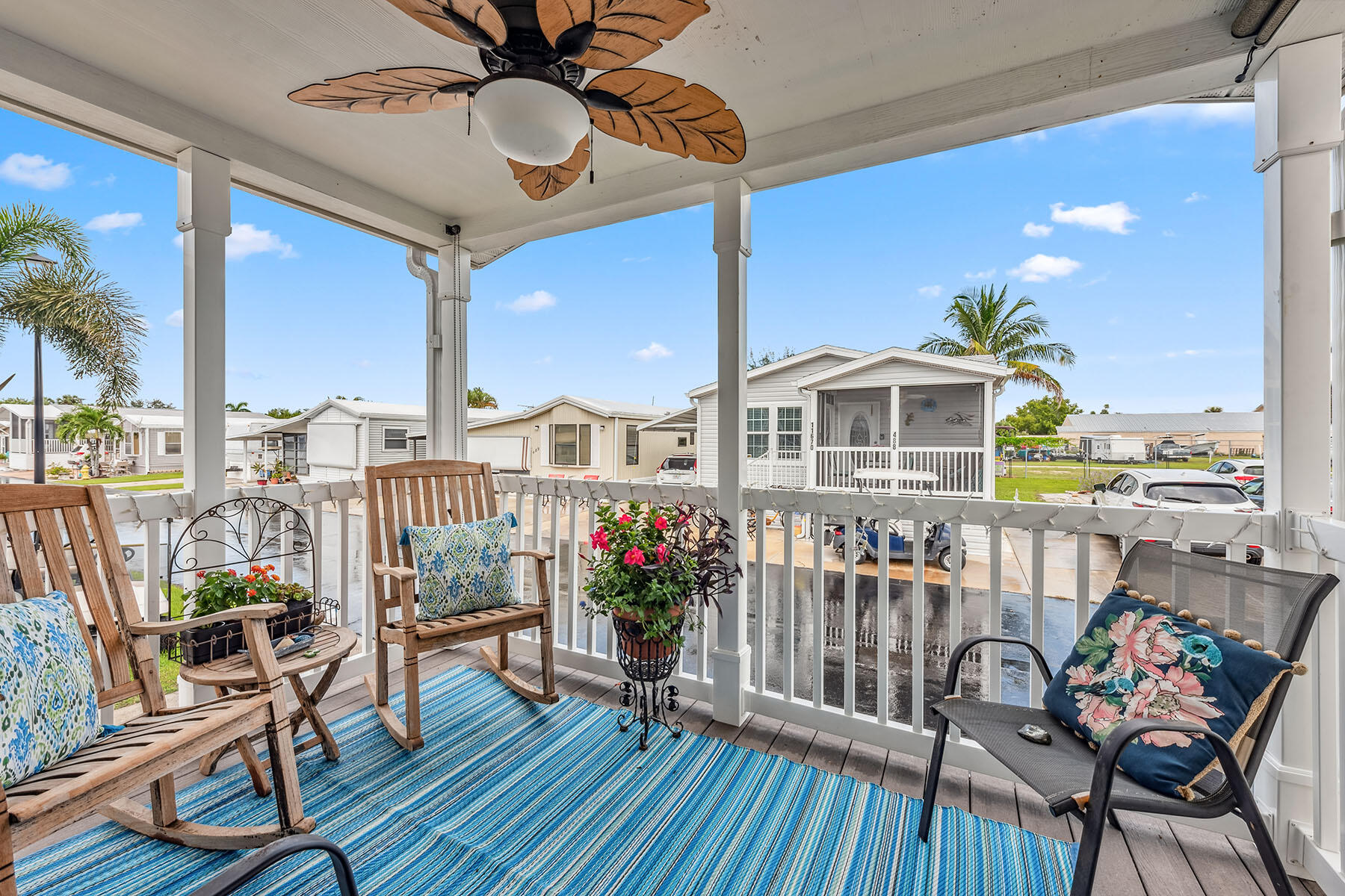 a view of a balcony with furniture