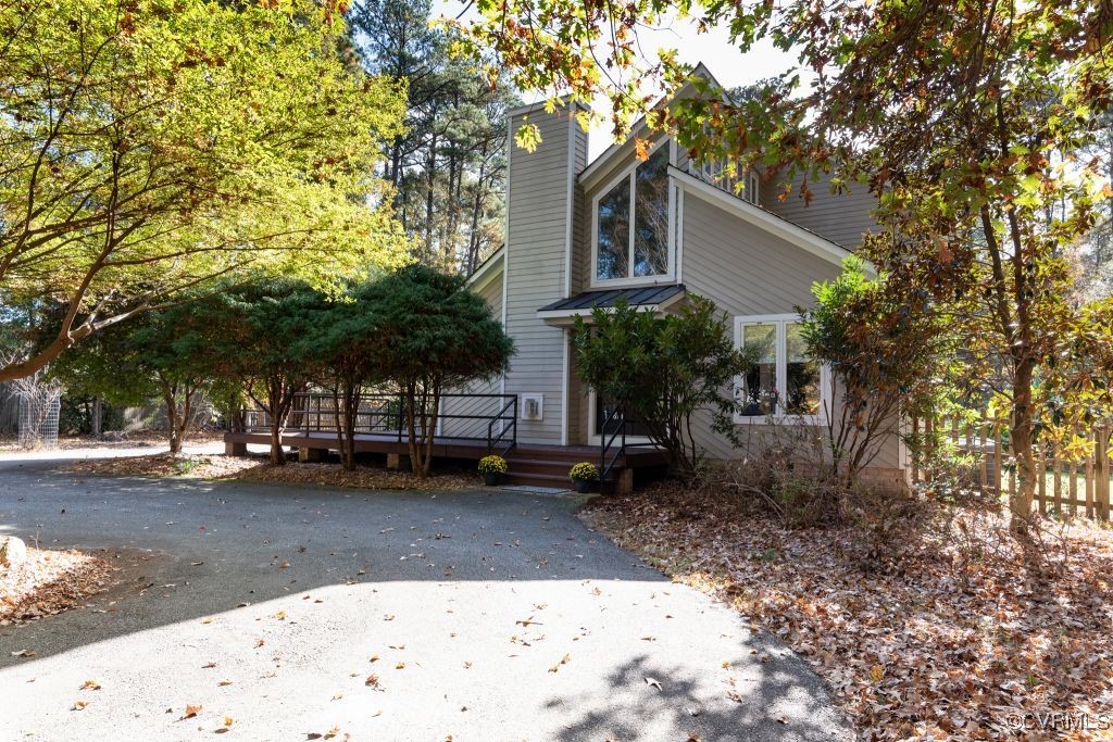 View of front of house featuring a deck