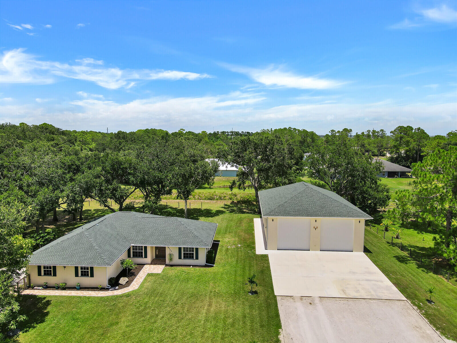 an aerial view of house with yard