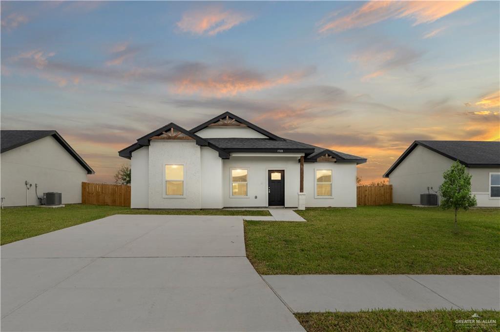 front view of house with a yard