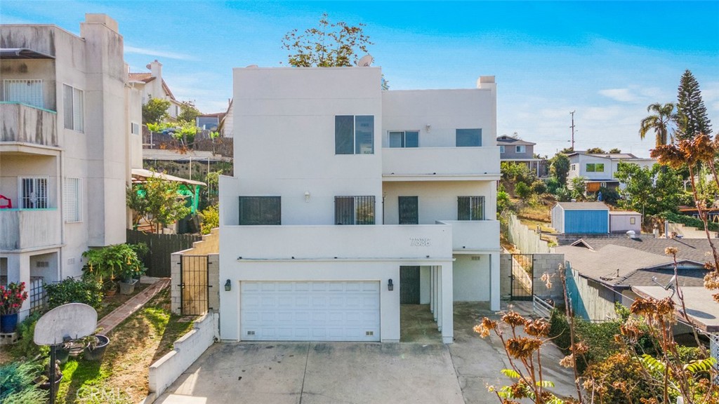 a aerial view of a house with a garden