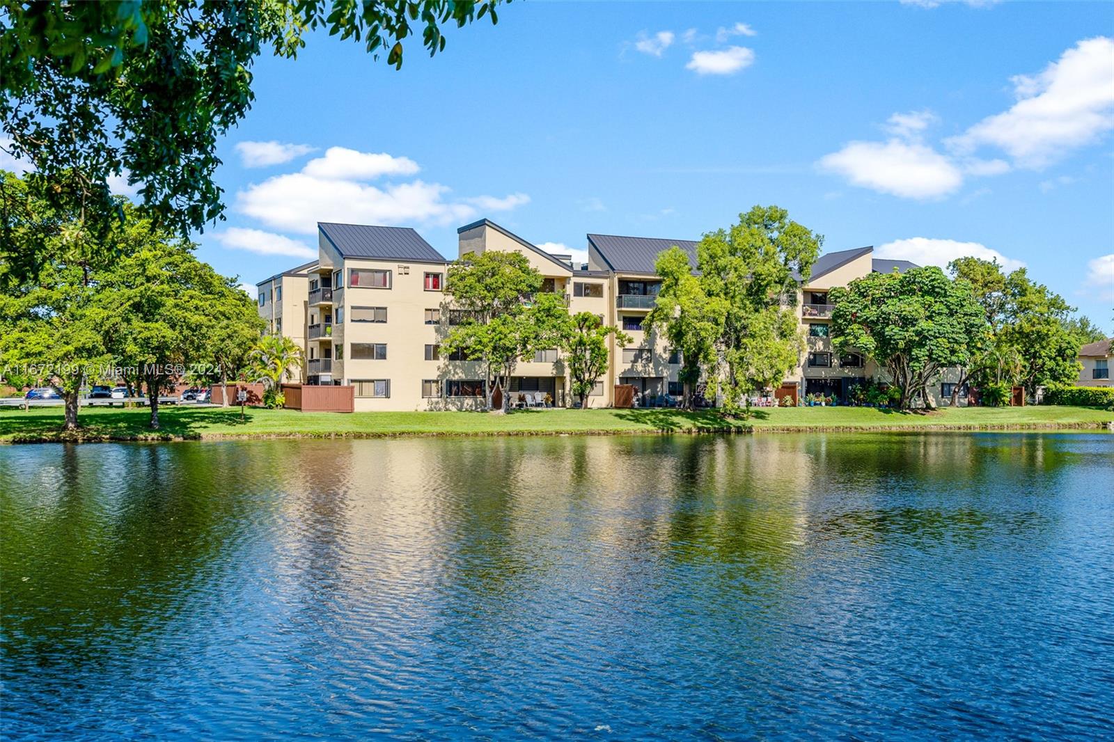 a view of a lake with a building in the background