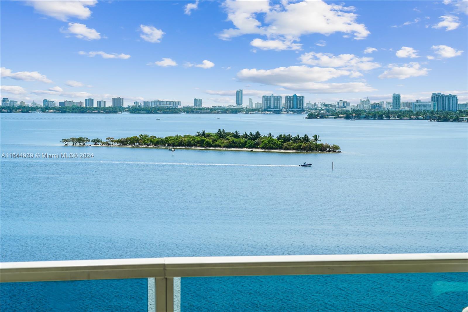 a view of a lake with a big yard