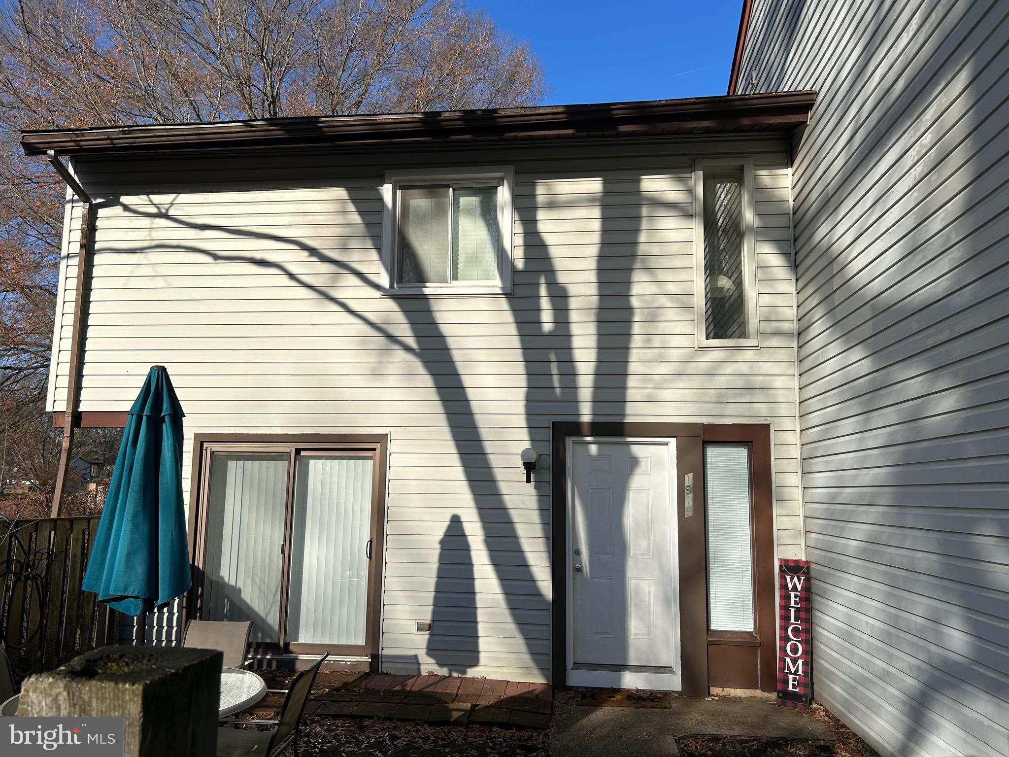 a front view of a house with a wooden floor